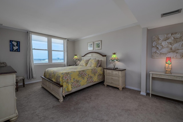 2800 N Atlantic Ave Unit 1716, Daytona Beach, FL 32118 - bedroom with crown molding, carpet flooring, and baseboards