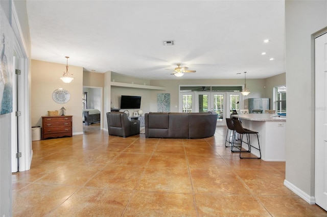 3671 Plantation Dr, Ormond Beach, FL 32174 - living room with ceiling fan, light tile patterned flooring, and recessed lighting