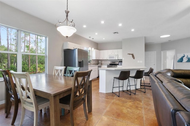 3671 Plantation Dr, Ormond Beach, FL 32174 - dining room with recessed lighting