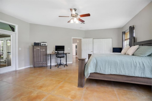 3671 Plantation Dr, Ormond Beach, FL 32174 - bedroom with light tile patterned floors, a ceiling fan, and an office area