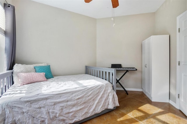 3671 Plantation Dr, Ormond Beach, FL 32174 - bedroom with ceiling fan and baseboards