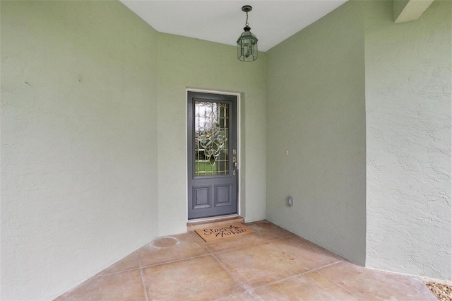 3671 Plantation Dr, Ormond Beach, FL 32174 - doorway to property with stucco siding