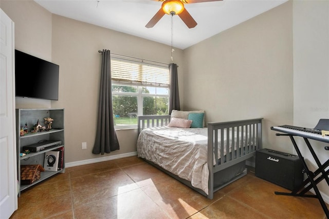 3671 Plantation Dr, Ormond Beach, FL 32174 - tiled bedroom featuring a ceiling fan and baseboards