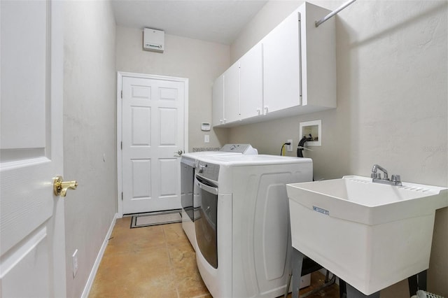 3671 Plantation Dr, Ormond Beach, FL 32174 - washroom with cabinet space and washing machine and dryer