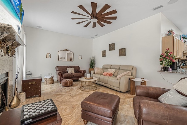 45 Saint Andrews Ct, Palm Coast, FL 32137 - living area with a ceiling fan and a fireplace