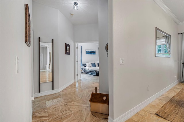 45 Saint Andrews Ct, Palm Coast, FL 32137 - hallway featuring light marble finish floors and crown molding