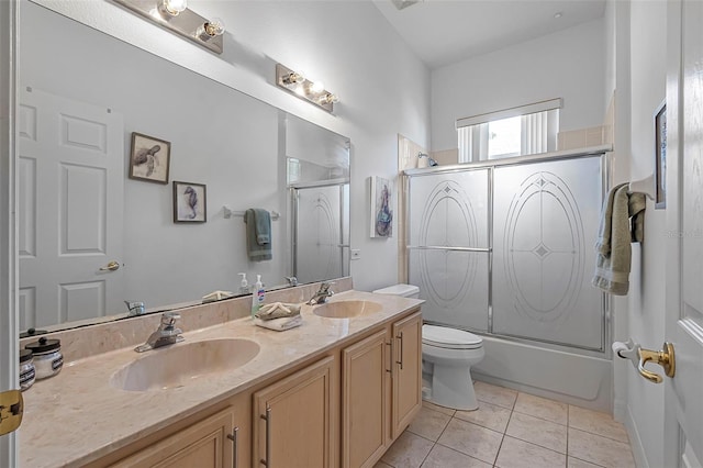 45 Saint Andrews Ct, Palm Coast, FL 32137 - bathroom featuring double vanity, enclosed tub / shower combo, and tile patterned floors