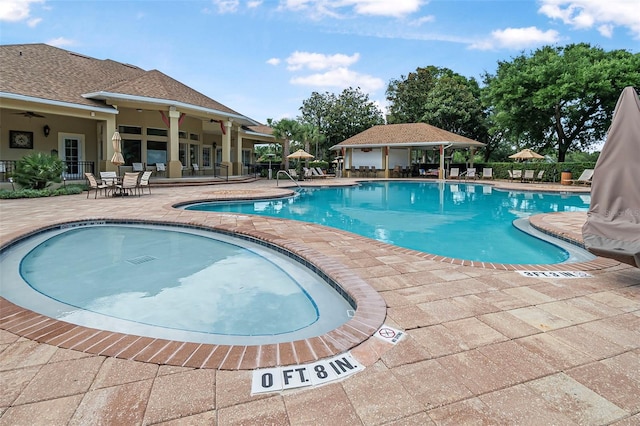45 Saint Andrews Ct, Palm Coast, FL 32137 - community pool featuring a patio area, a gazebo, and a ceiling fan