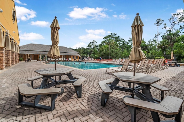 45 Saint Andrews Ct, Palm Coast, FL 32137 - community pool with a patio area