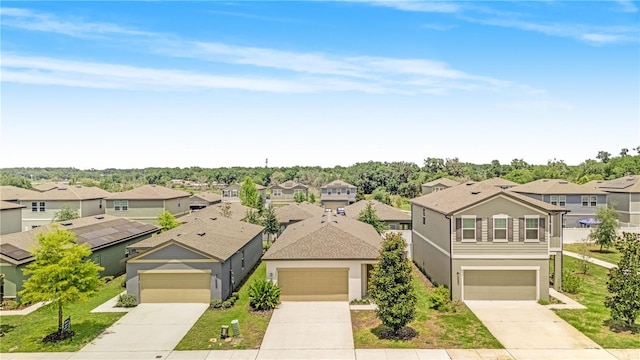 2241 Litchfield Loop, Deland, FL 32720 - view of front of home with a residential view, a garage, and driveway