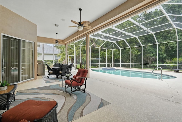 33 Coquina Ridge Way, Ormond Beach, FL 32174 - swimming pool featuring ceiling fan, a patio area, and a lanai