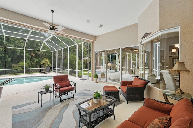 33 Coquina Ridge Way, Ormond Beach, FL 32174 - outdoor pool featuring an outdoor hangout area, a patio area, glass enclosure, and a ceiling fan