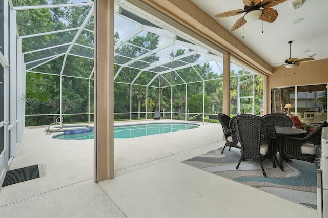 33 Coquina Ridge Way, Ormond Beach, FL 32174 - view of swimming pool featuring a ceiling fan, a patio, and glass enclosure