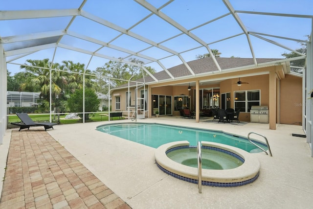 33 Coquina Ridge Way, Ormond Beach, FL 32174 - view of pool with a ceiling fan, a patio, a pool with connected hot tub, a grill, and a lanai