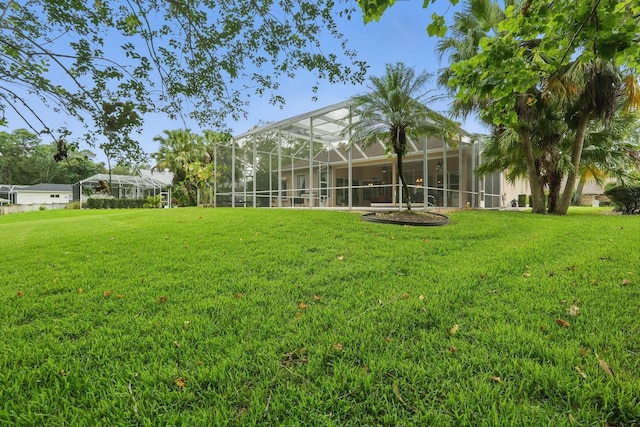 33 Coquina Ridge Way, Ormond Beach, FL 32174 - view of green lawn with glass enclosure