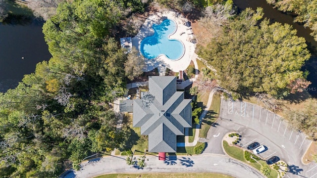33 Coquina Ridge Way, Ormond Beach, FL 32174 - aerial view of property's location with a pool area and a nearby body of water