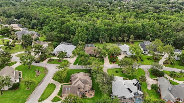 33 Coquina Ridge Way, Ormond Beach, FL 32174 - aerial view of residential area featuring a heavily wooded area