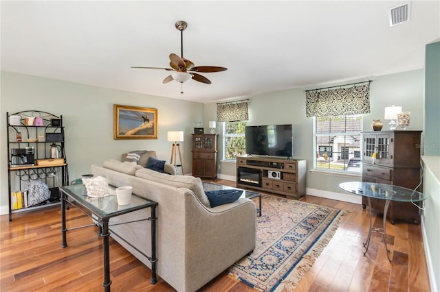 2250 Davis Dr, New Smyrna Beach, FL 32168 - living room featuring ceiling fan and wood-type flooring