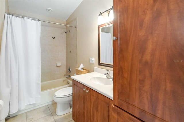 2250 Davis Dr, New Smyrna Beach, FL 32168 - bathroom featuring vanity, tile patterned flooring, and shower / bath combination with curtain