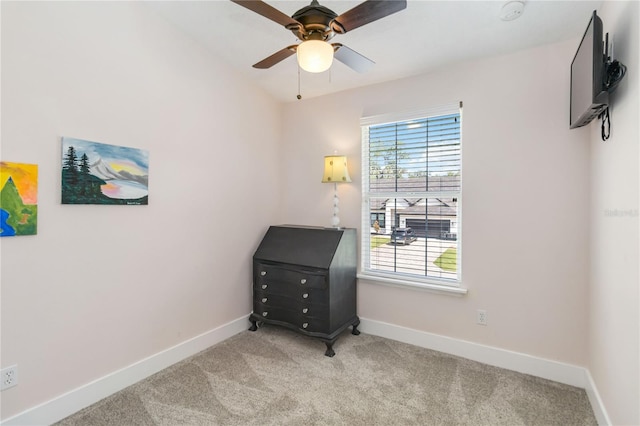 2250 Davis Dr, New Smyrna Beach, FL 32168 - bedroom featuring light colored carpet and a ceiling fan