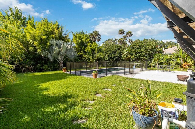 2250 Davis Dr, New Smyrna Beach, FL 32168 - view of yard featuring a patio area