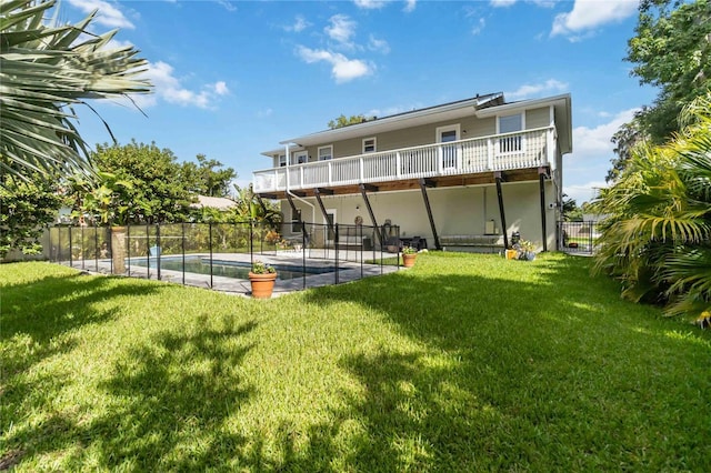 2250 Davis Dr, New Smyrna Beach, FL 32168 - back of house featuring a fenced backyard and a patio