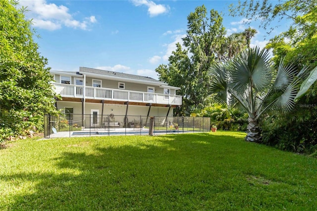 2250 Davis Dr, New Smyrna Beach, FL 32168 - rear view of house with a balcony