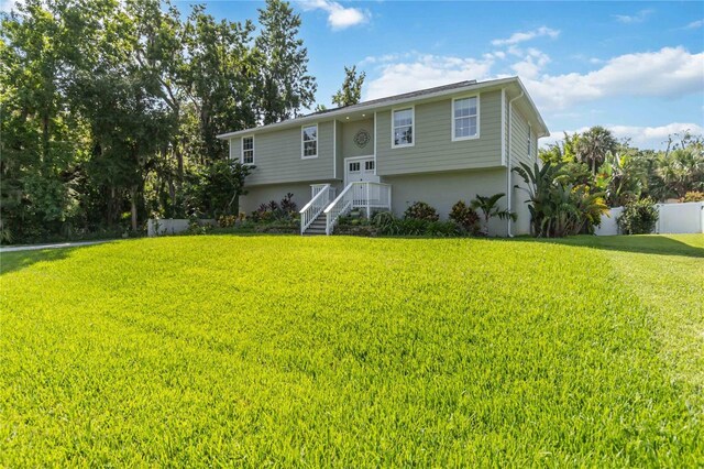 2250 Davis Dr, New Smyrna Beach, FL 32168 - raised ranch with stucco siding