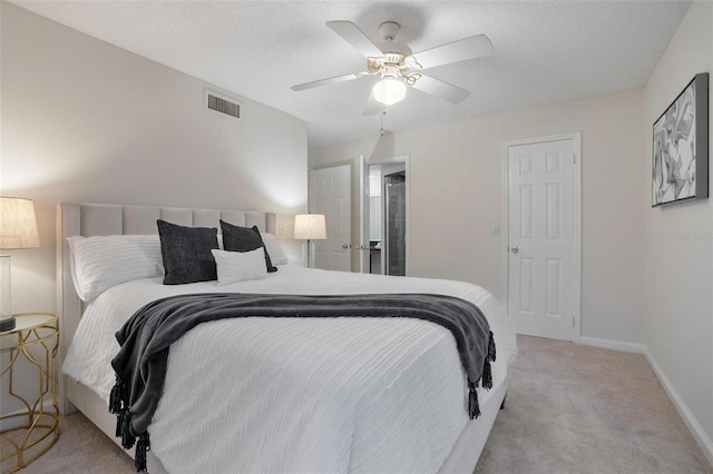 940 Douglas Ave Unit 189, Altamonte Springs, FL 32714 - bedroom with carpet flooring, a ceiling fan, and a textured ceiling