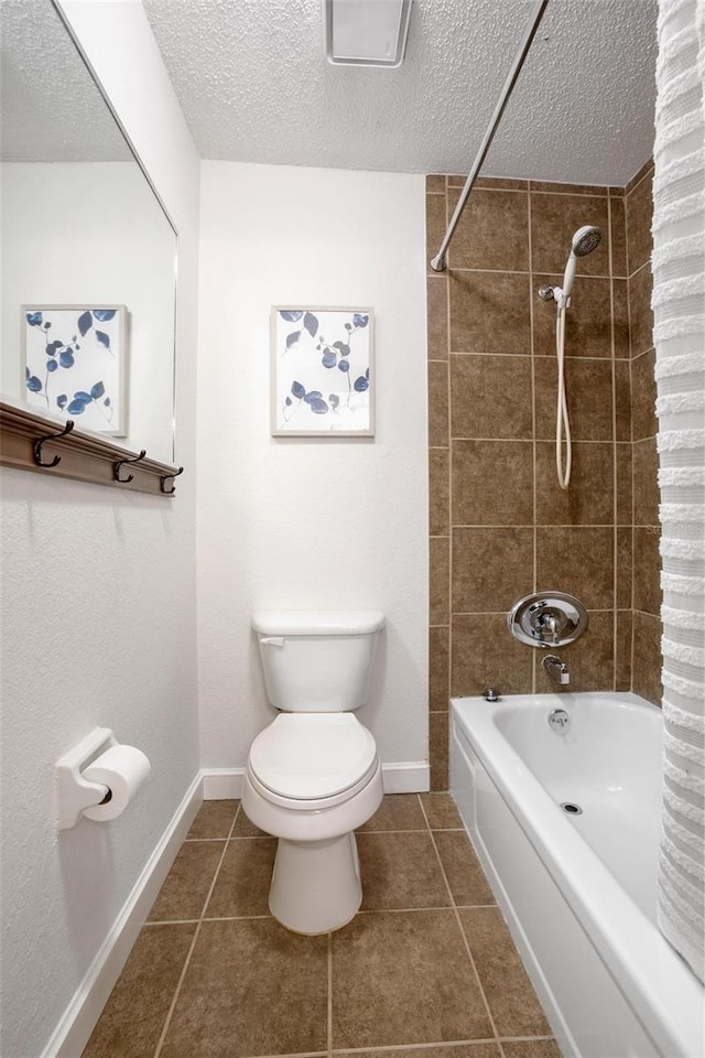 940 Douglas Ave Unit 189, Altamonte Springs, FL 32714 - full bathroom with a textured ceiling, shower / bath combo, and tile patterned floors
