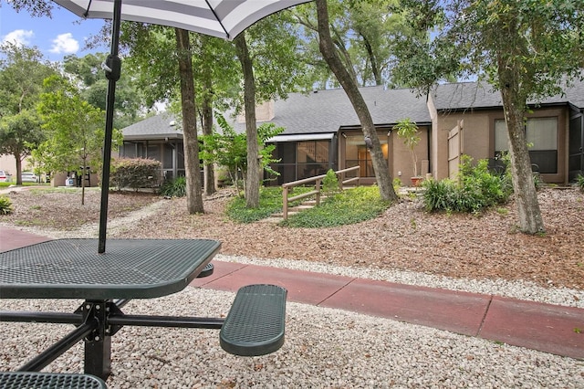 940 Douglas Ave Unit 189, Altamonte Springs, FL 32714 - view of yard with a sunroom