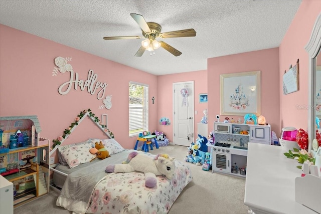 3132 Mango Tree Dr, Edgewater, FL 32141 - carpeted bedroom featuring a textured ceiling and ceiling fan