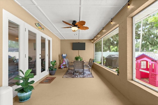3132 Mango Tree Dr, Edgewater, FL 32141 - sunroom featuring french doors, track lighting, and ceiling fan