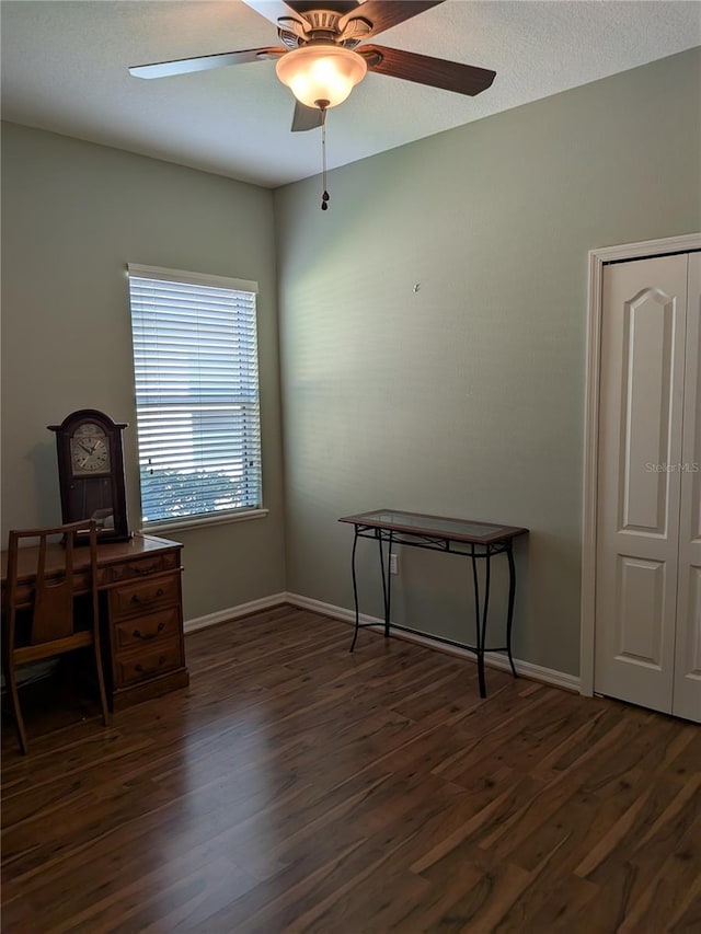223 W Fiesta Key Loop, Deland, FL 32720 - unfurnished office featuring a ceiling fan and dark wood-style floors