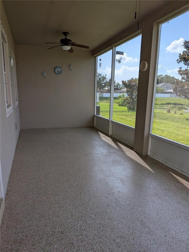 223 W Fiesta Key Loop, Deland, FL 32720 - unfurnished sunroom featuring healthy amount of natural light and a water view