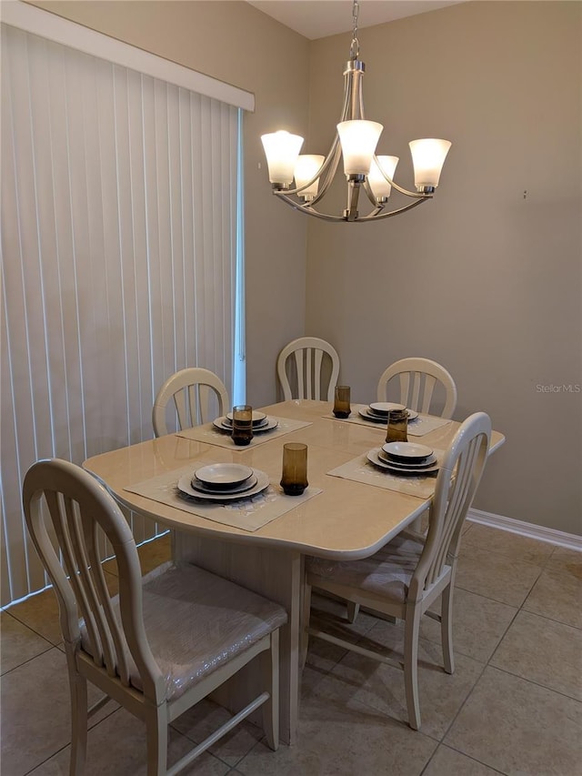 223 W Fiesta Key Loop, Deland, FL 32720 - dining area with a chandelier and light tile patterned flooring
