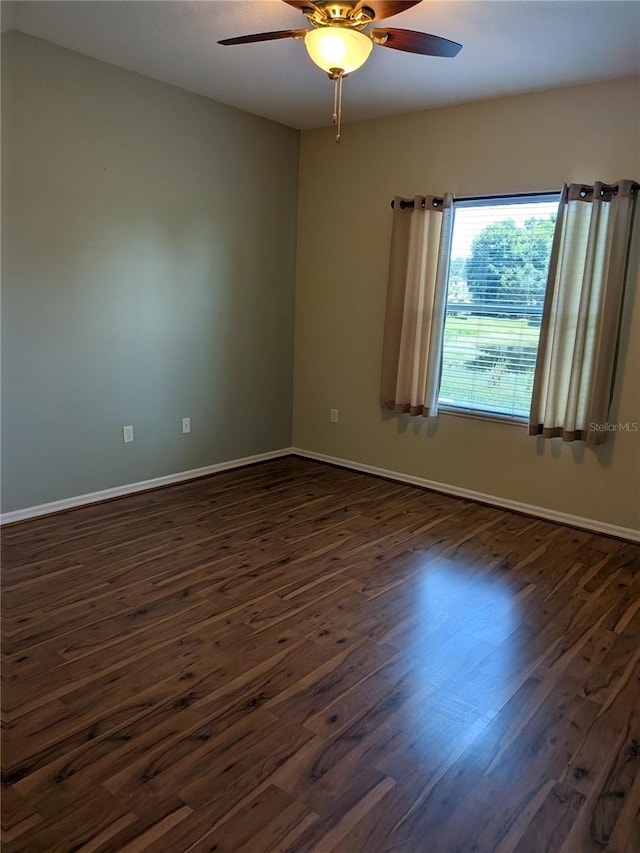 223 W Fiesta Key Loop, Deland, FL 32720 - spare room featuring ceiling fan and dark wood-type flooring