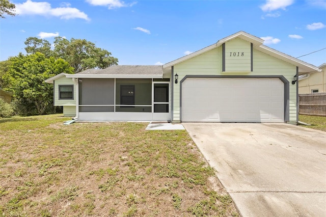 1018 E Gaucho Cir, Deltona, FL 32725 - ranch-style home with an attached garage, concrete driveway, a sunroom, a front lawn, and roof with shingles