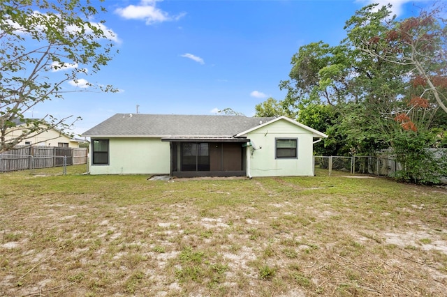 1018 E Gaucho Cir, Deltona, FL 32725 - back of property featuring a sunroom and stucco siding