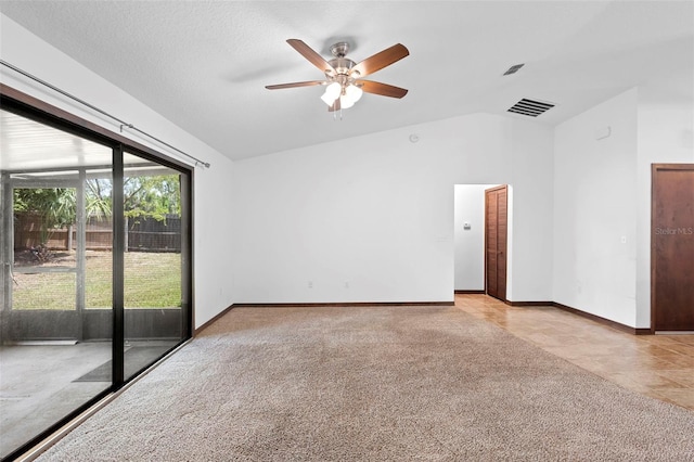 1018 E Gaucho Cir, Deltona, FL 32725 - unfurnished room with vaulted ceiling, ceiling fan, light carpet, and baseboards