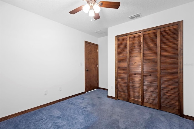 1018 E Gaucho Cir, Deltona, FL 32725 - unfurnished bedroom featuring carpet floors, baseboards, a closet, and a ceiling fan