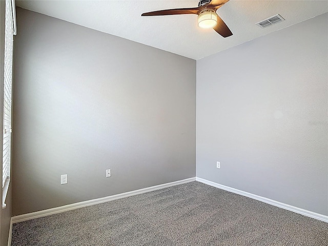 422 Armoyan Way, New Smyrna Beach, FL 32168 - empty room with a ceiling fan, carpet, and baseboards