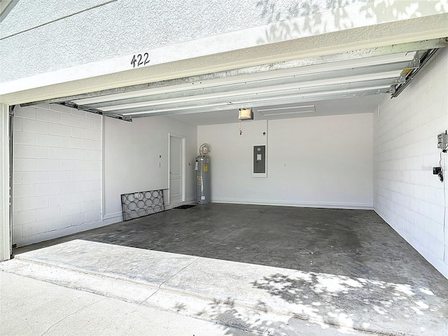 422 Armoyan Way, New Smyrna Beach, FL 32168 - garage with electric water heater, concrete block wall, a garage door opener, and electric panel