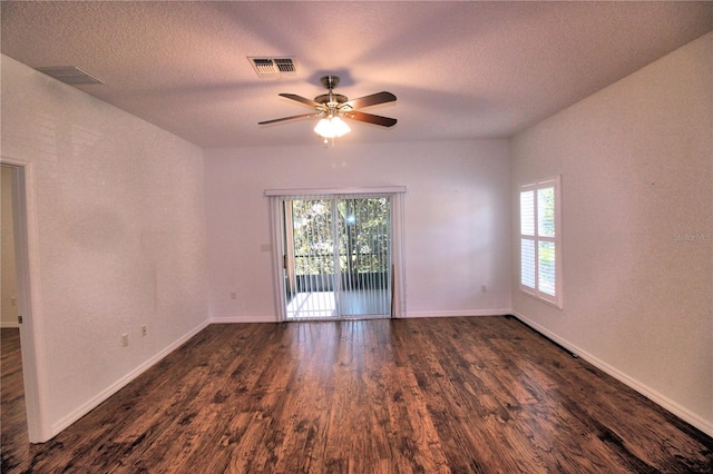 201 Walter Stevens Way, Deland, FL 32724 - spare room featuring wood finished floors, ceiling fan, a textured ceiling, and baseboards
