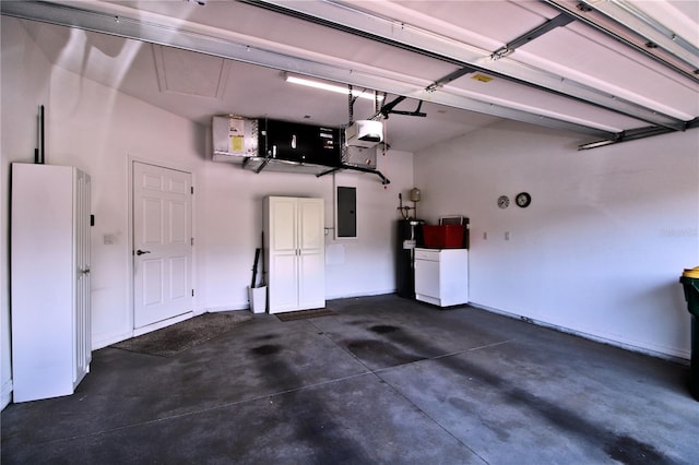 201 Walter Stevens Way, Deland, FL 32724 - garage with electric panel, water heater, and a garage door opener