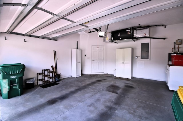 201 Walter Stevens Way, Deland, FL 32724 - garage with electric panel and a garage door opener
