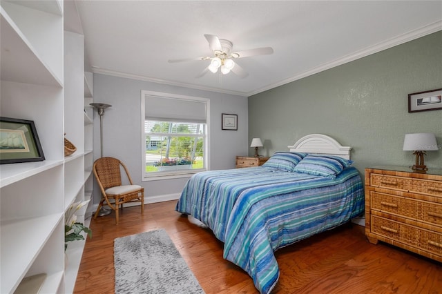 179 Ann Rustin Dr S, Ormond Beach, FL 32176 - bedroom with ornamental molding, wood finished floors, a ceiling fan, and baseboards