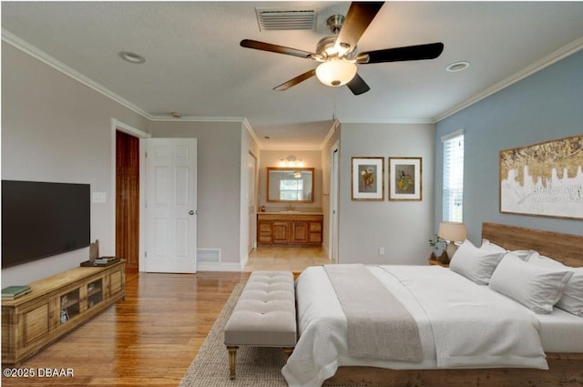 65 Sycamore Cir, Ormond Beach, FL 32174 - bedroom featuring light wood-style flooring, ensuite bathroom, crown molding, recessed lighting, and ceiling fan