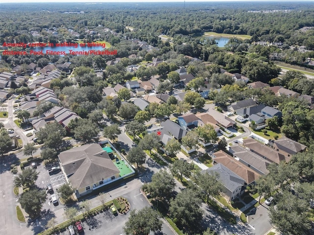 202 W Chancery Ln, Deland, FL 32724 - aerial view of residential area featuring a heavily wooded area and a large body of water