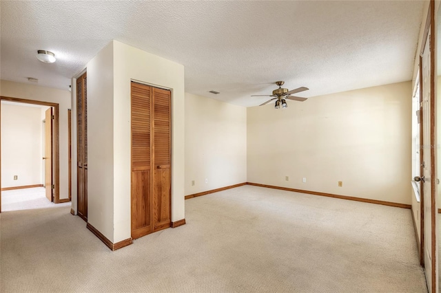 840 Center Ave Unit 280, Daytona Beach, FL 32117 - empty room featuring light carpet, a ceiling fan, and a textured ceiling